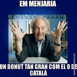 EM MENJARIA  UN DONUT TAN GRAN COM EL 0 DE CATALÀ